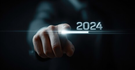 Hand pressing 2024 on a futuristic interface