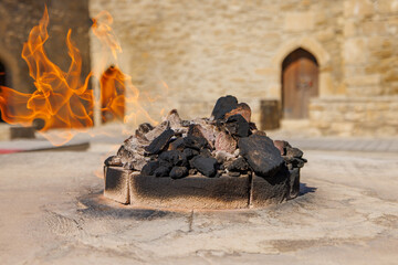 Close up view of a gas fire pit at the Atashgah Zoroastrian Fire Temple, Azerbaijan