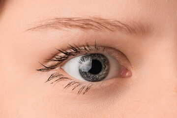 Obraz premium Young woman with beautiful eyes, closeup