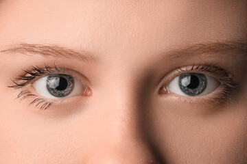 Fototapeta premium Young woman with beautiful eyes, closeup