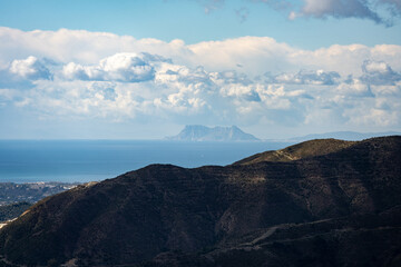 Distant view of the Rock of Gibraltar from Across the Sea taken from the Pico de la Concha, Spain