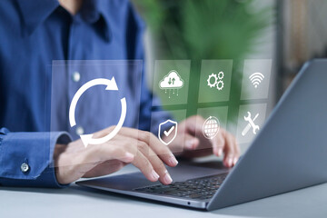 Person using laptop to update and upgrade system software for modernize, released new version and...