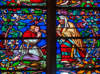 Stained glass (19th century) of Jesus parable : the return of the prodigal son.
