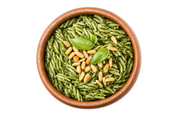 Delicious pesto pasta in wooden bowl with pine nuts and basil leaves italian cuisine food photography isolated on transparent background