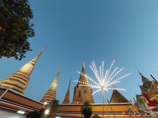Electric lighting decoration for celebrate in Wat pho temple under evening sky