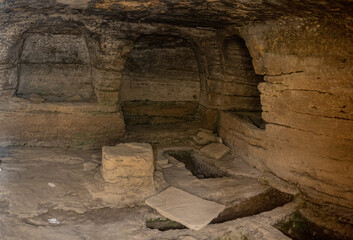 Ancient Stone Cave with Carved Walls from the Roman Necropolis of Osuna, Spain