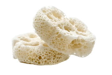 Two natural loofah sponges close up view on black background