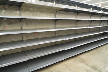 empty store shelves in supermarket