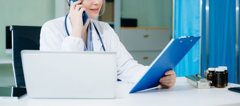 Woman doctor phone call, healthcare talking and medical service writing sick note, surgery planning and prescription.and clinical report test results