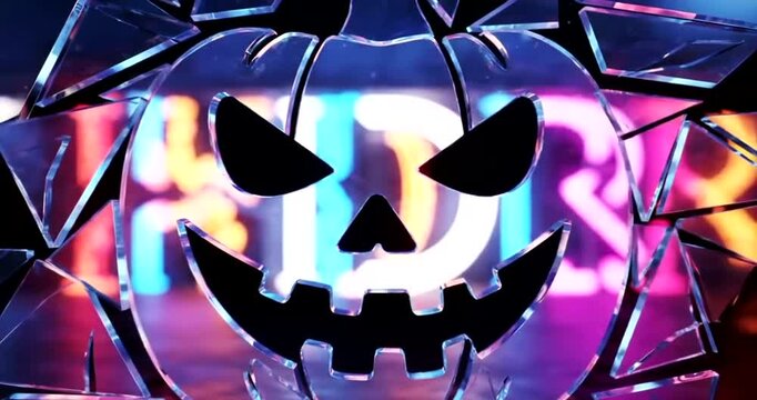 A spooky jack-o'-lantern with a menacing face is shattered into pieces against a backdrop of neon lights.