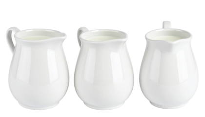 Porcelain ceramic milk jars or creamers isolated on transparent background. 