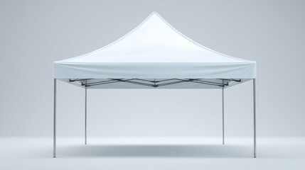 A white pop-up canopy tent with a peaked roof stands on a plain, neutral background