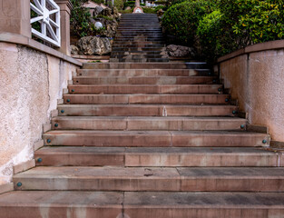 Marble staircase in the park on a summer day.