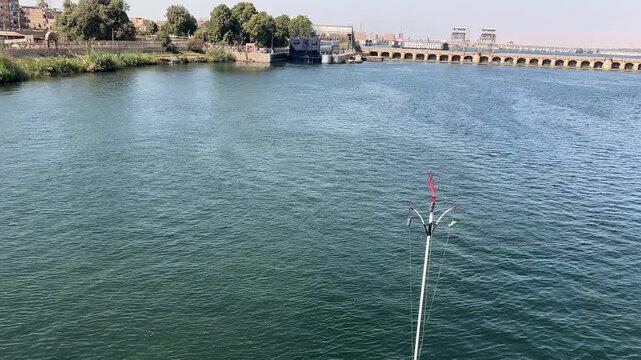 Cruise ship approaching the Esna Lock on the Nile River, Egypt