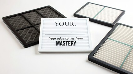 Creative display of air filters with motivational message on a neutral background
