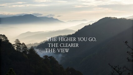 Scenic mountain landscape with mist and inspirational quote