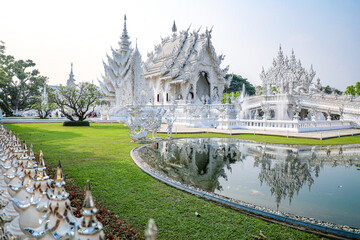 Wat Rong Khun, or the White Temple, is a Buddhist temple located in Chiang Rai, Thailand. The...