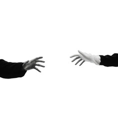 Naklejka premium Two gloved hands reaching to meet