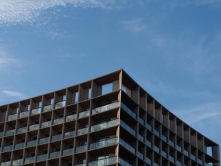 Fototapeta premium City buildings against blue sky