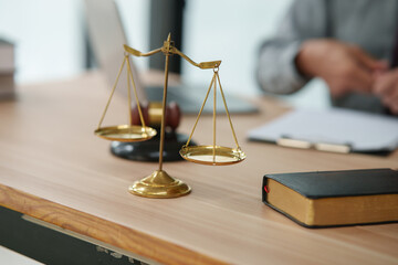 lawyers or attorneys discussing a contract agreement. Successful businessmen have a contract in place to protect it,signing of modest agreements form in office..	