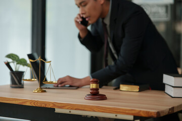 Lawyers use smartphones to talk to clients about legal advice.