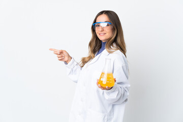 Young Romanian scientific woman isolated on white background pointing finger to the side