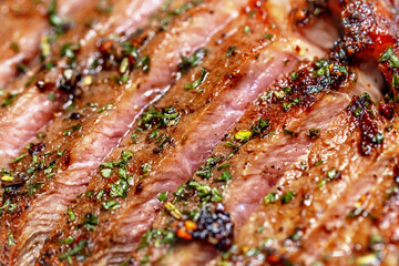 grilled beef steak with black pepper and rosemary