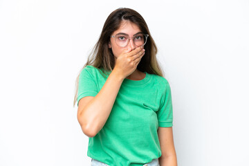 Young caucasian woman isolated on white background covering mouth with hand
