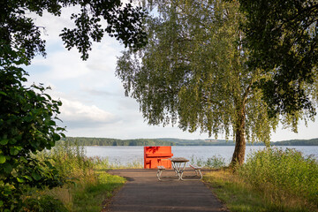 Public Outdoor Piano and Picnic Table by Molkomssjön Lake in Molkom, Sweden
