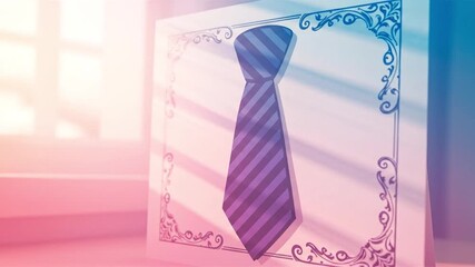 A heartfelt Father's Day greeting card featuring a striped necktie design, resting on a surface with soft, colorful lighting from a window.