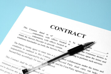 Pen on the contract papers
