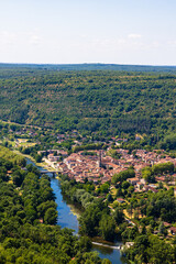 Obraz premium Medieval Town of Saint-Antonin-Noble-Val on the Aveyron River from the Cliffs of Roc d’Anglars in Summer
