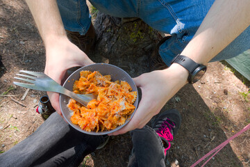 Close-up of cooked pasta with sauce in bowl at camping site at Morteratsch in the Swiss Alps on a sunny summer day. Photo taken August 26th, 2025, Morteratsch Pontresina, Switzerland.