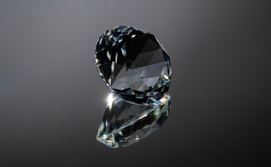 Diamond, One big round crystal, clear Diamond on black background, with reflection. Gemstone, Clear...