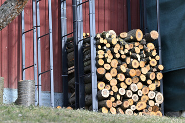 Drying wood in stands from iron for winter heating