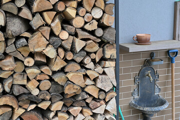 Detail close up for wood drying near the wall house for winter heating
