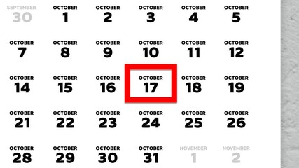 The date October 17th marked with a red cursor on the wall calendar 2025