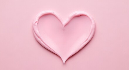 Pink heart shape made of cream on a pink background
