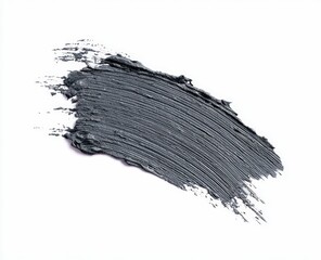 Gray mascara smudge on white background