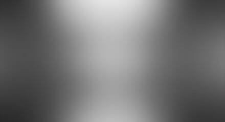 Naklejka premium Grayscale gradient background with textured grain and subtle spotlight effects, perfect for modern design projects.