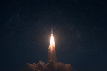 Magnificent rocket launch soars through the night sky, illuminated by a fiery plume against backdrop of stars, concept for space exploration, technological advancement and scientific discovery