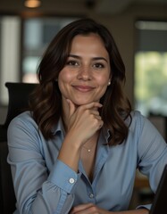 Young hispanic woman at the office with hand on chin thinking about question pensive expression smiling with thoughtful face doubt concept Professional Worker Portrait Ultra realistic Photoreali