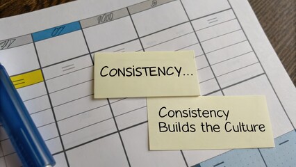 Office planner with sticky notes emphasizing consistency and culture building
