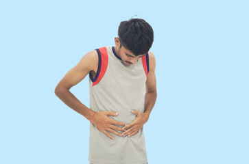 Young Man Holding Stomach in Pain, Stomach Ache and Health Problem Concept