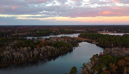 Obraz premium Autumnal river valley at sunset