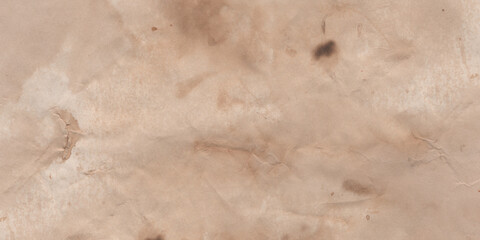 Wide banner. Texture of old papyrus. Old paper. Burnt yellow old paper. Historical background. Vintage pattern