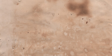 Wide banner. Texture of old papyrus. Old paper. Burnt yellow old paper. Historical background. Vintage pattern