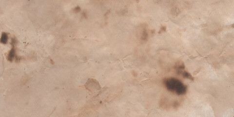 Wide banner. Texture of old papyrus. Old paper. Burnt yellow old paper. Historical background. Vintage pattern