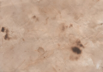 Old papyrus texture. Old paper. Burnt yellow old paper. Historical background. Vintage pattern