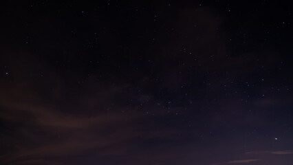 night sky with clouds and stars